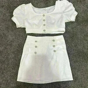 White matching set with pearl buttons